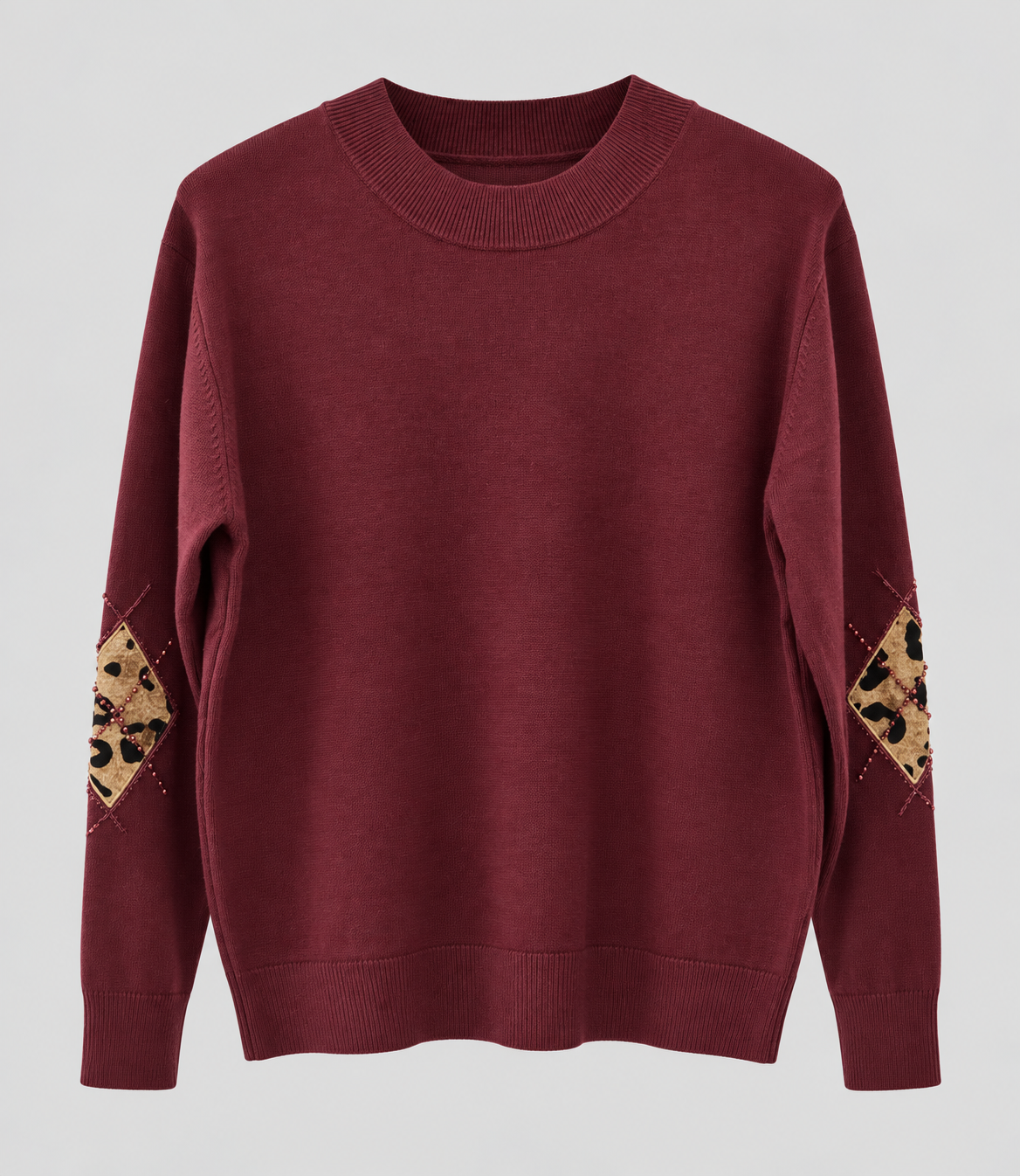 Pullover mit Leo-Details & Perlen – Creme
