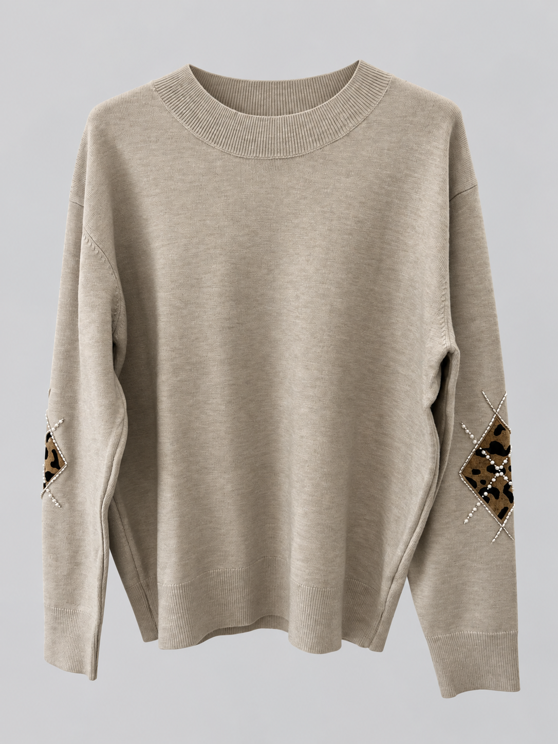 Pullover mit Leo-Details & Perlen – Creme